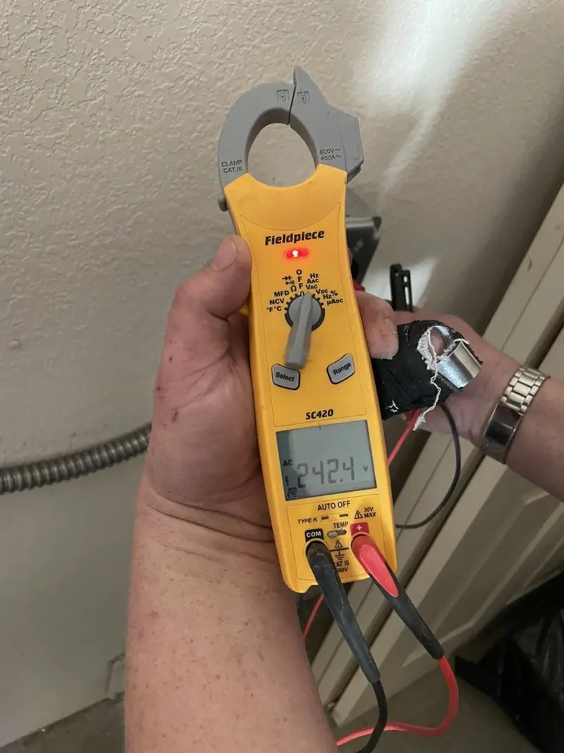 Voltage testing with clamp meter during Aluminum Wiring Replacement in Ellettsville